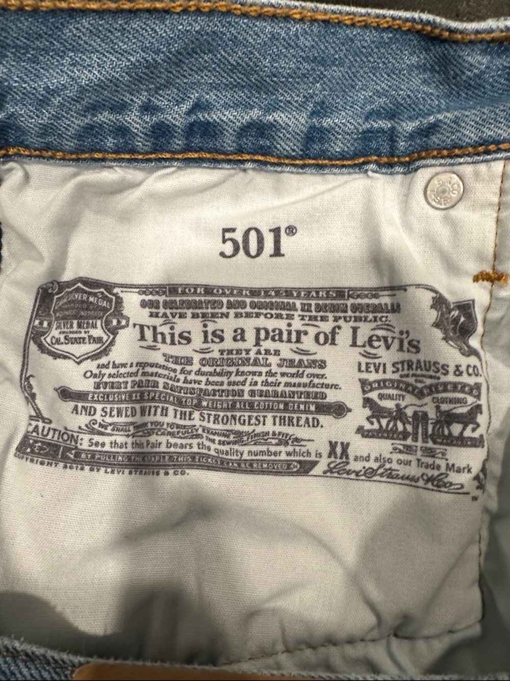 Levi's Light Blue Distressed Cutoff Denim Shorts - Picture 3 of 7